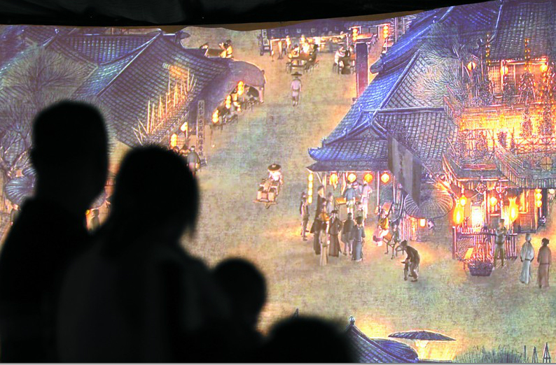 市民游客观赏3D版《清明上河图》