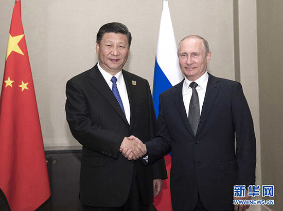 6月8日，国家主席习近平在阿斯塔纳会见俄罗斯总统普京。