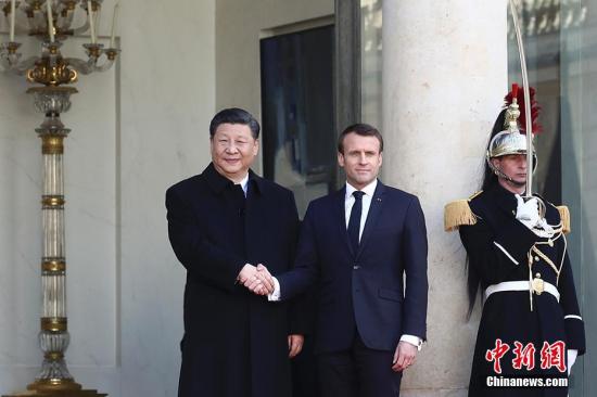 当地时间3月25日，中国国家主席习近平在巴黎爱丽舍宫同法国总统马克龙会谈。中新社记者